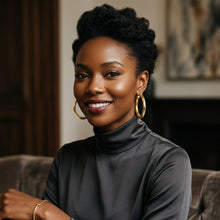 Model wearing 2 inch 18K gold plated textured hoop earrings with a chic turtleneck
