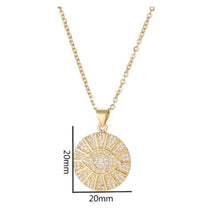Gold stainless steel Evil Eye rhinestone pendant necklace with sparkling crystal accents.