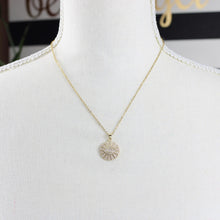 Gold stainless steel Evil Eye rhinestone pendant necklace with sparkling crystal accents on mannequin