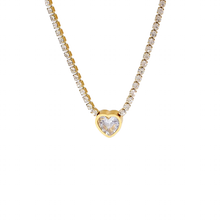 A gold-tone stainless steel necklace with a heart-shaped pendant featuring a rhinestone.