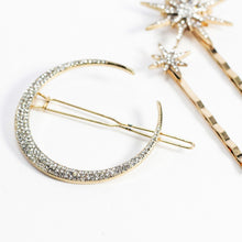 Celestial moon and star rhinestone hair pin set in gold.