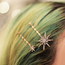 Sparkling moon and star hair pins with gold-tone finish and rhinestone details for elegant celestial-inspired hairstyles.
