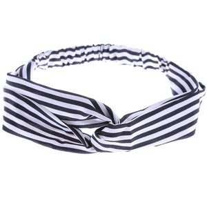 You will look gorgeous wearing this black and white stripe twist loop headband. Made of cotton/polyester blend and have elastic on the back of the headband for comfort. 