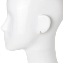18K gold plated cross stud earrings with cubic zirconia rhinestones on mannequin.