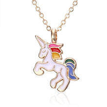 Rainbow enamel unicorn necklace. Includes a card that reads "The Sparkle is Real". Colors: Gold or Silver. Gold necklace measures 16" long with 2" extension. Silver necklace measures 17" long with 1 1/2" extension or 20" long with 2" extension.