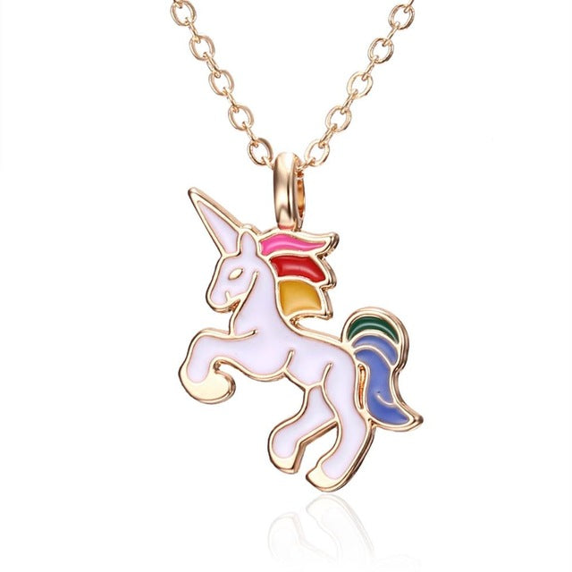 Rainbow enamel unicorn necklace. Includes a card that reads 