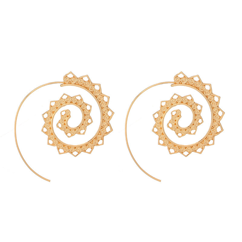 Spiral wire earrings with decorative accents on both sides. Rubber backing included to secure earring. Measure 1 1/2
