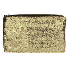 Sequin clutch has a zippered top plus a small zipper pouch on the inside for discreet items. The interior is a leopard vinyl pattern. Clutch measures 9 1/2" wide by 6" tall. Top zipper opening measures 7 1/2" wide.  Color: Gold.