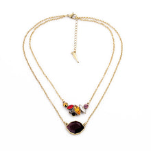 Antique gold colored necklace with gorgeous colorful merlot pendant. First layer measures 15 1/2" long and second layer measures 18" long. Necklace has a 2" extension. Matching earrings sold separately.
