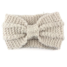 Comfortable and warm headband perfect for the cold weather. Color: Beige.