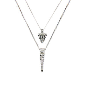Vintage style triangle necklace embellished with glass crystals and a antique silver metal color.
