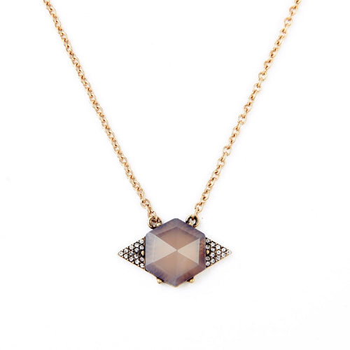 Geo glam necklace in an antique gold tone chain with a resin khaki octagon shape pendant with rhinestone triangles on each side. Necklace measures 16