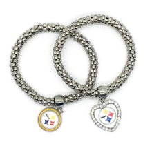 Show the love of your football team with this Steelers pendant bracelet. Heart shaped rhinestone pendant. Stretch bracelet measures 6 1/2". Heart pendant measures 1" long by 7/8" wide.