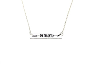"She Persisted" Engraved Necklace - Left Arrow