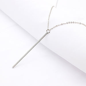 Trendy bar necklace that is modern and will add style to your outfit. Available colors: silver, gold, and black.