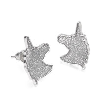 Adorable silver enameled glitter unicorn earrings. Earrings measure 3/4" long by 1/2" wide.