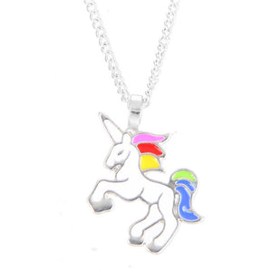 Rainbow enamel unicorn necklace. Available in silver or gold color chain/pendant. Includes a card that reads "The Sparkle is Real".