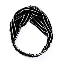Stylish twist loop nylon headband with elastic for comfort fit. Colors: Black with white stripes.