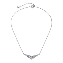 Modern silver color geometric triangle shape necklace. Necklace measures 17" long with 2" extension. Pendant measures 2" wide.