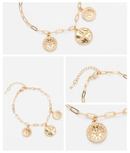 Dainty gold charm paperclip chain bracelet with cross charms view of different angles