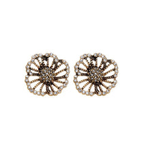 Vintage style rhinestone flower stud earrings on white background. 
